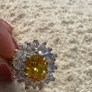 Elegant Gold and Silver tone Ring with Yellow Gemstone